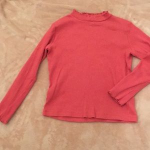 A textured pink longsleeve Tee